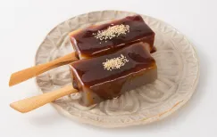 Konnyaku (konjac) skewers glazed with a savory red miso dengaku sauce